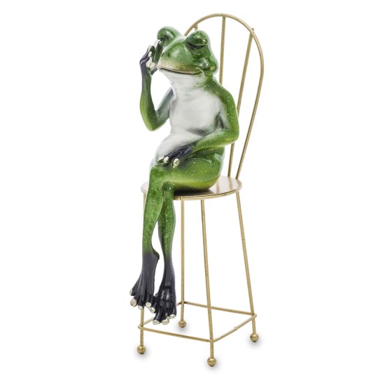 A frog in a chair with a phone
