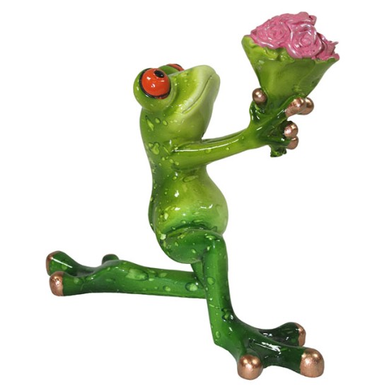 A figure of a frog with a bouquet of flowers